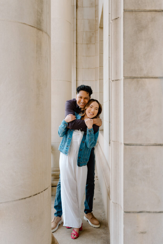 engaged couple bear hug in holland, michigan engagement session