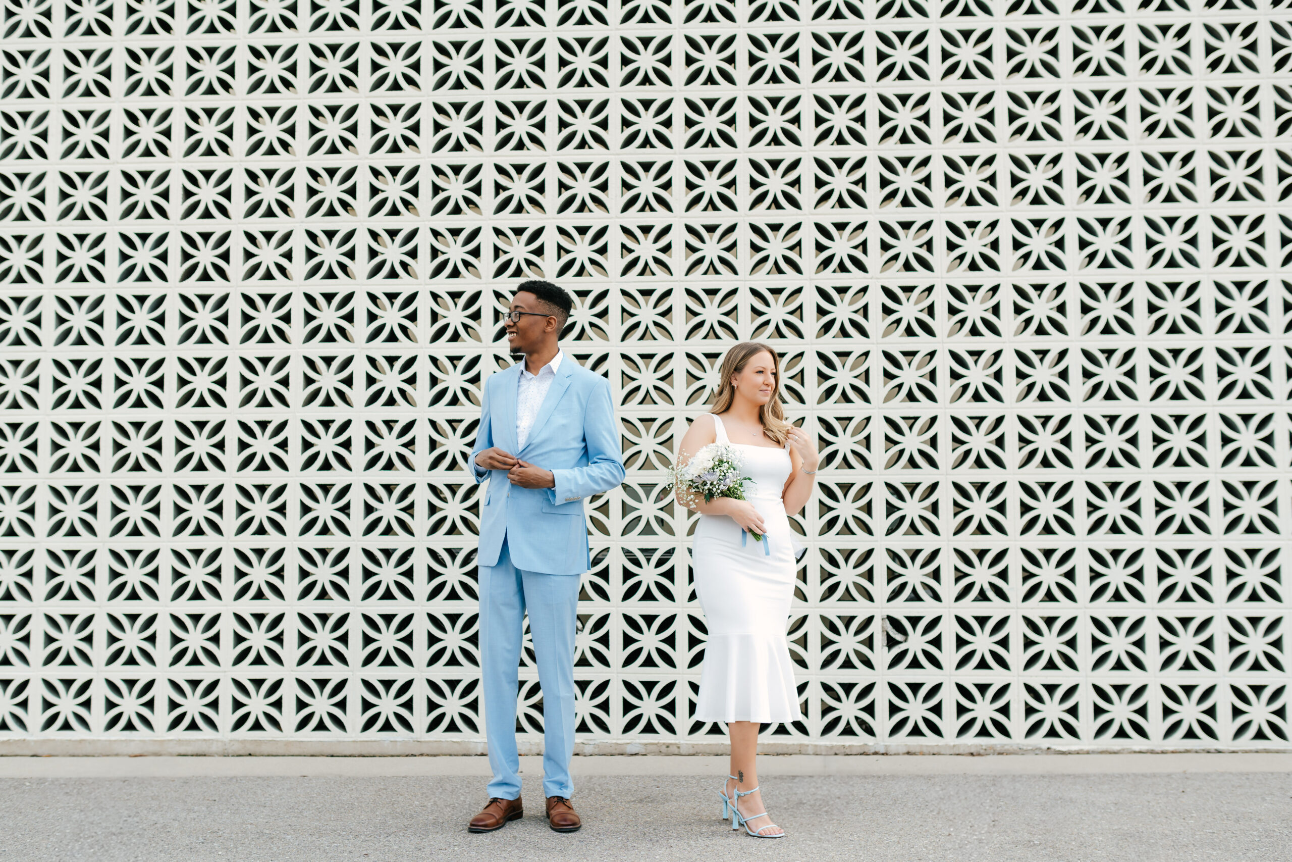 bride and groom formal portrait downtown grand rapids, michigan after courthouse elopement