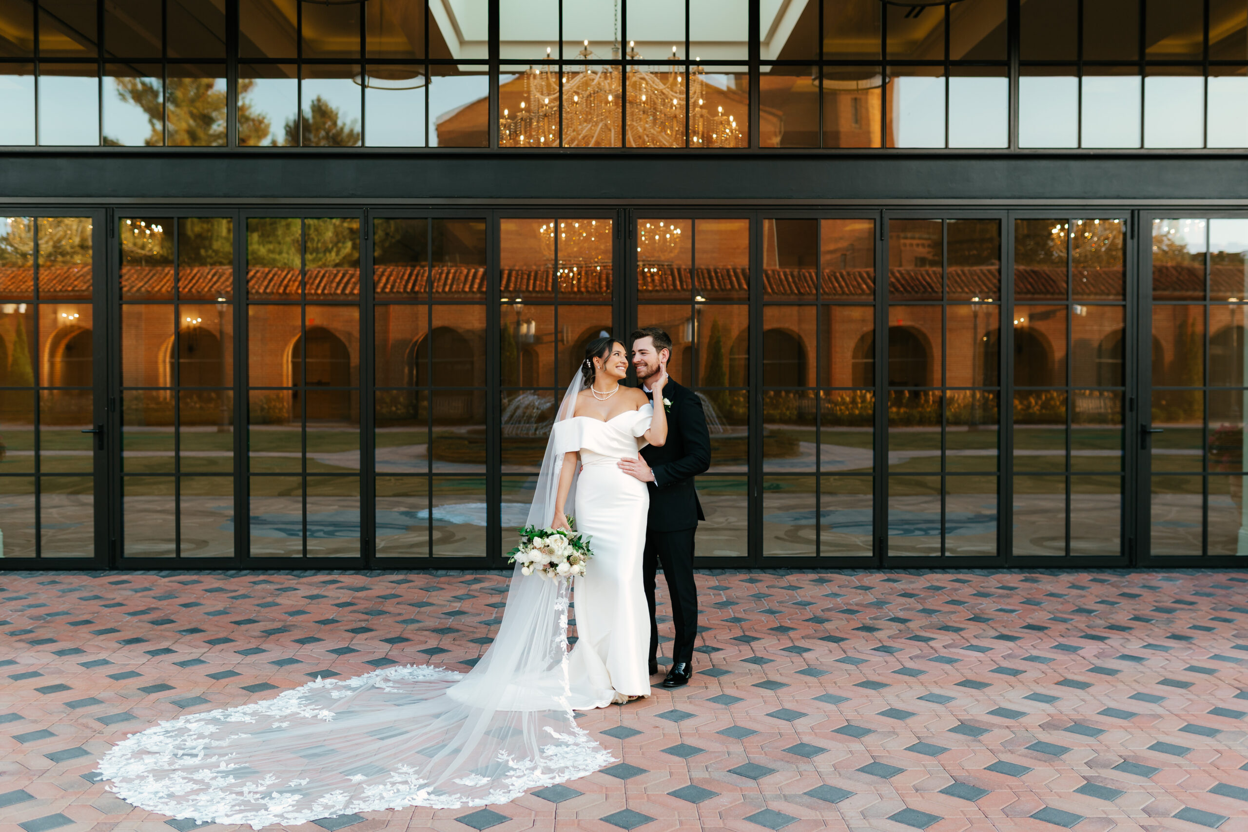 Sunset couple portrait outdoors at Saint John’s Resort wedding.